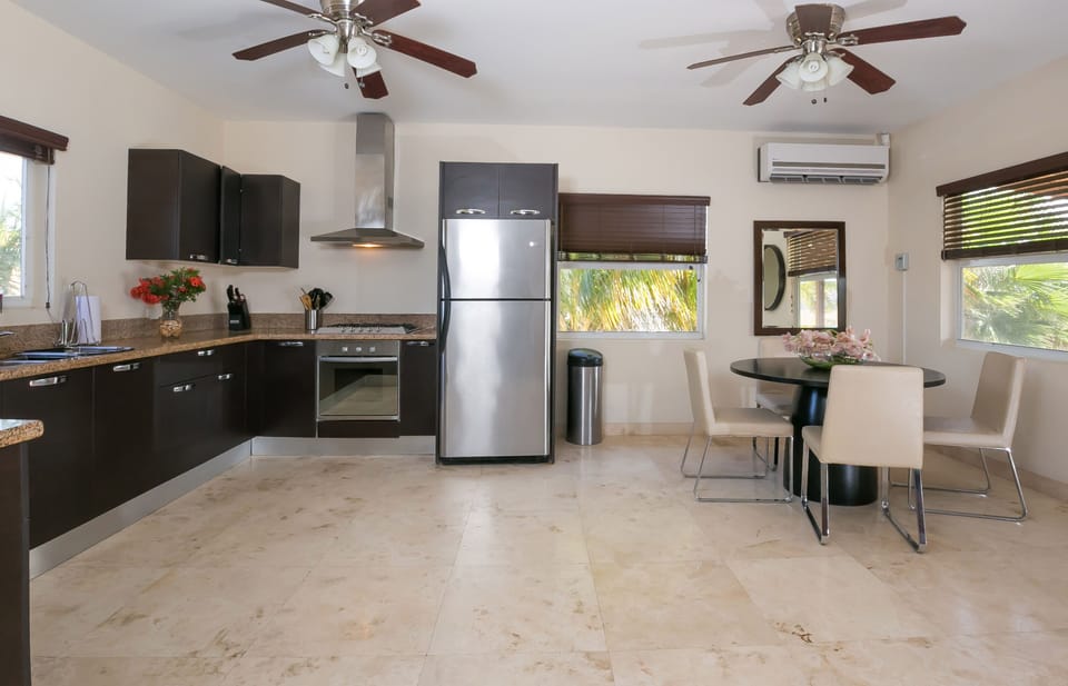 Open space concept kitchen and dining area allow everyone to be together. 