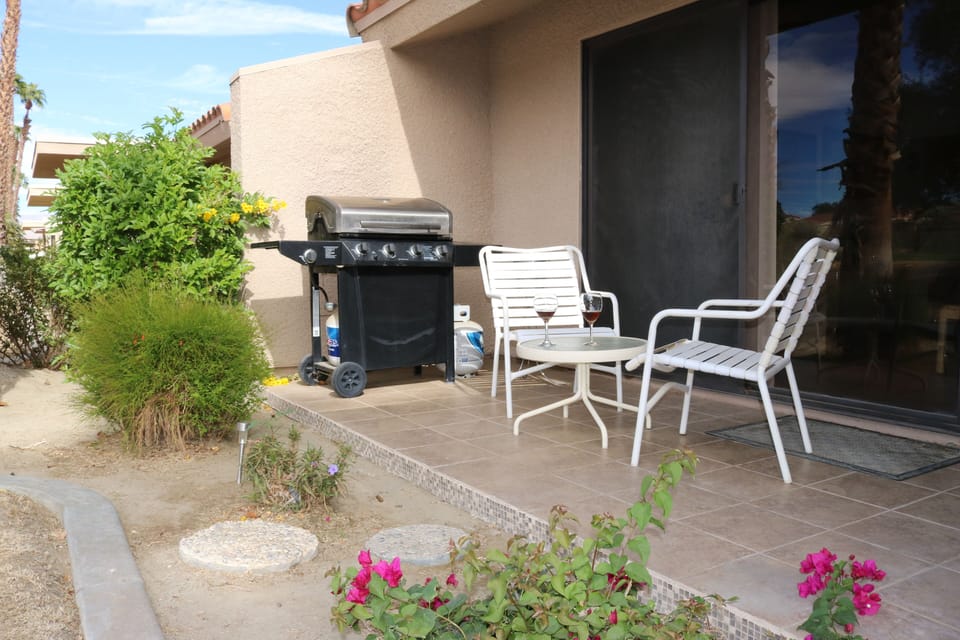 Deck contains barbeque, chairs and table.  Steps from pool and spa!