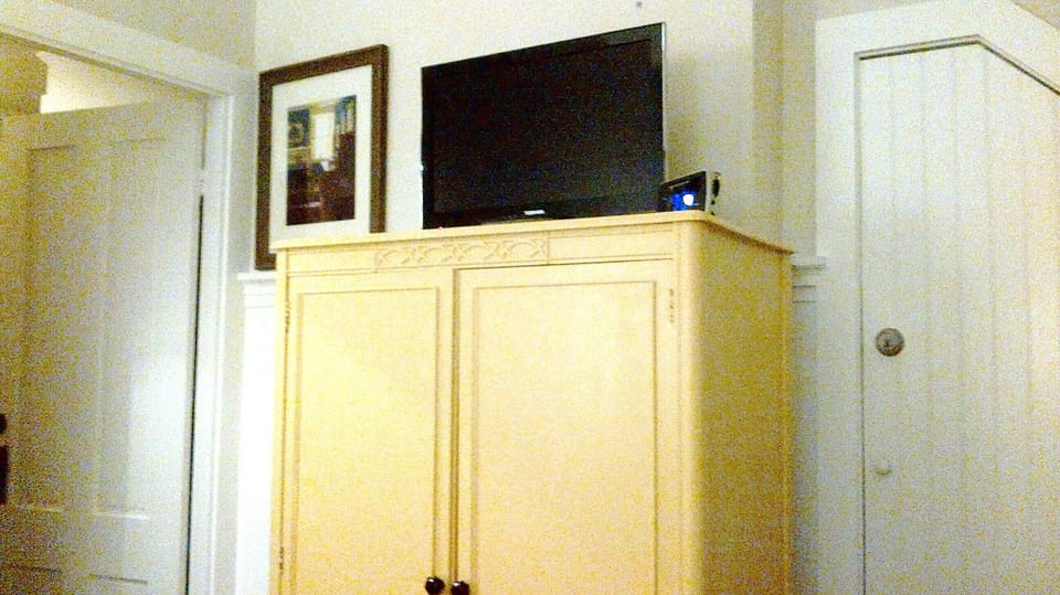Chifferobe for hanging / folded clothes and cable television in the King Bedroom