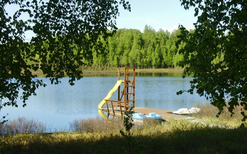 Lake with Paddle Boats, Canoes and Swimming Dock.
