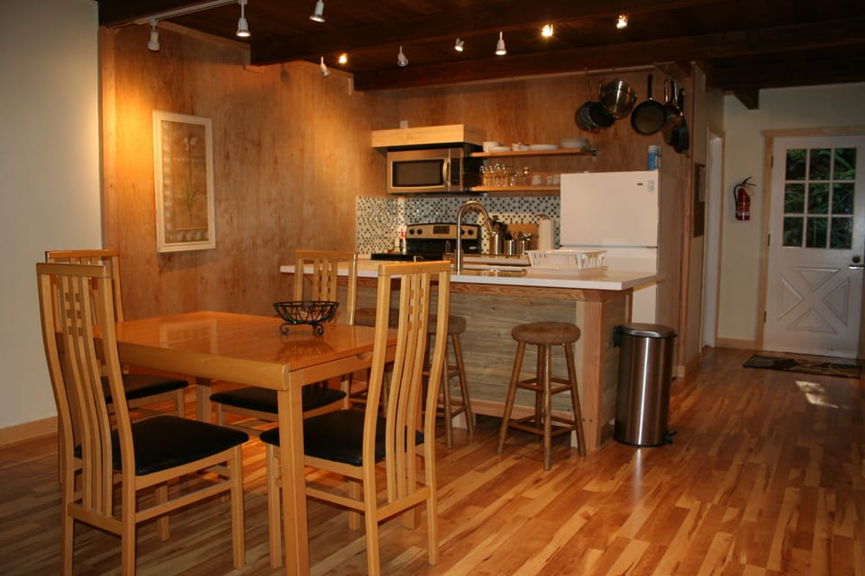 Open flex space on main floor with kitchen, dining, living, 1.5 bath