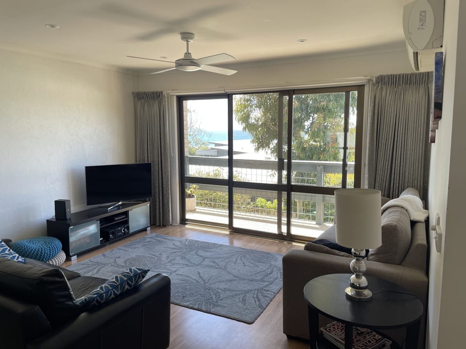Lounge room with view to the beach.