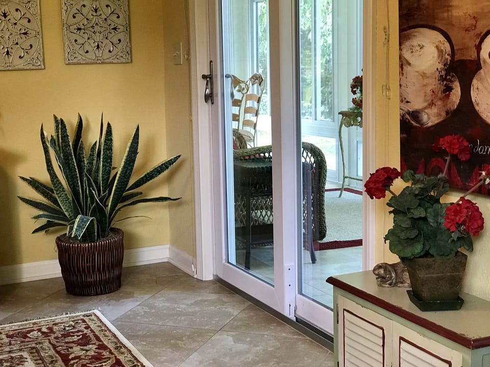 Entrance to sunroom from game room. 