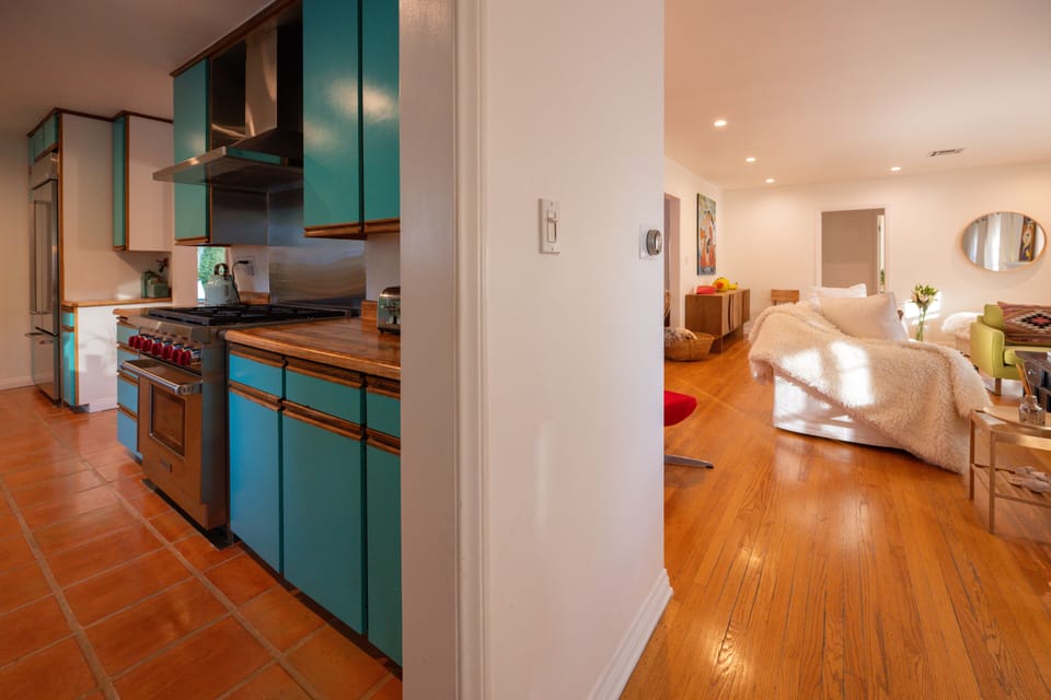 Kitchen view and fireplace living room