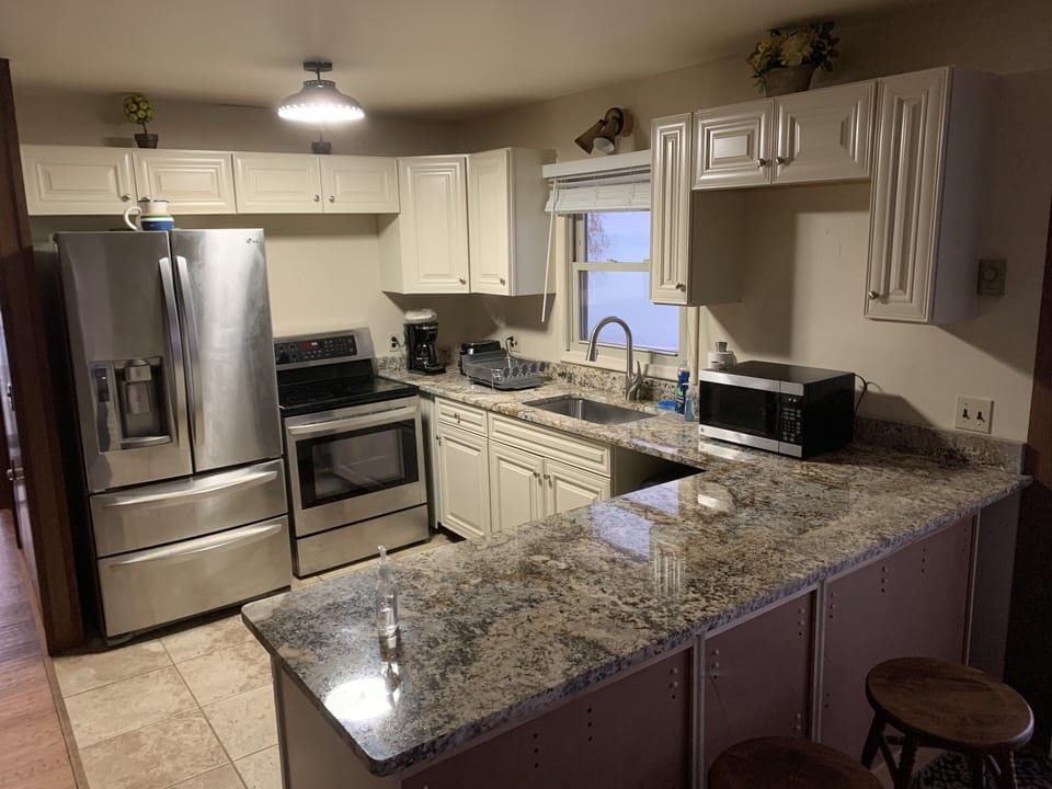 Newly updated kitchen and granite top.