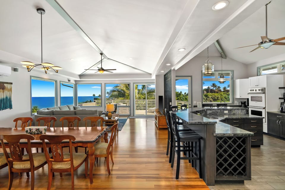 Open "Reverse Living" Floor Plan with dining table for 10!