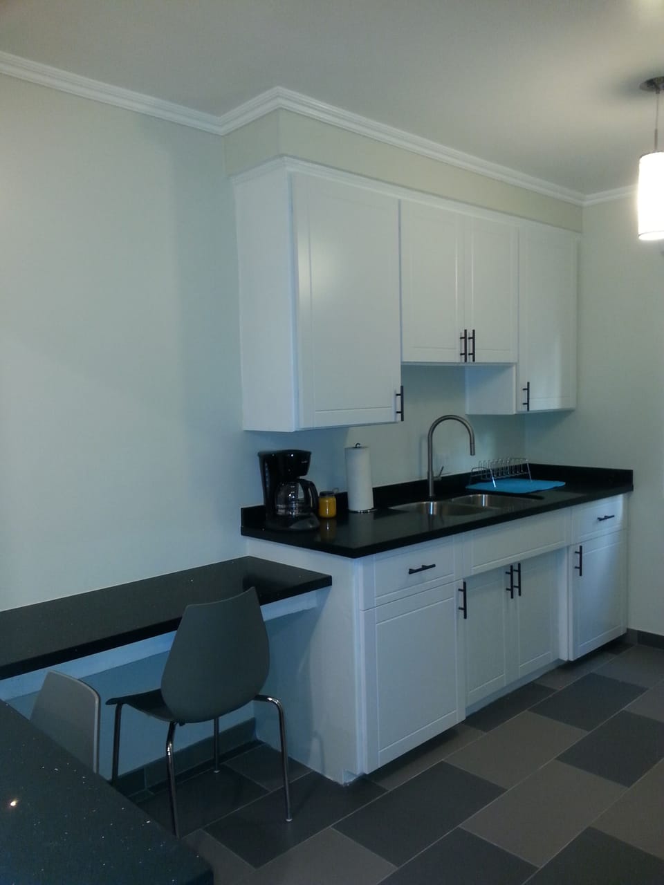 Complete kitchen with brand new counter top, and sitting area