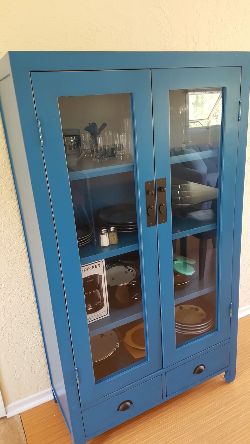 Storage for dishes, pots, pans, coffee maker, etc