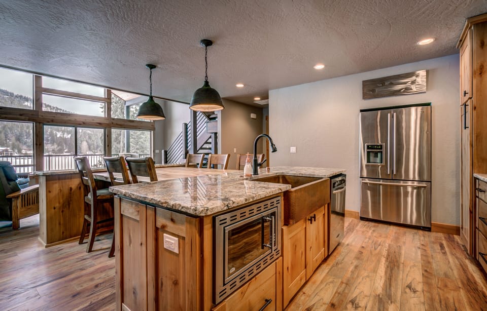 Hammered copper sink and stainless steel appliances