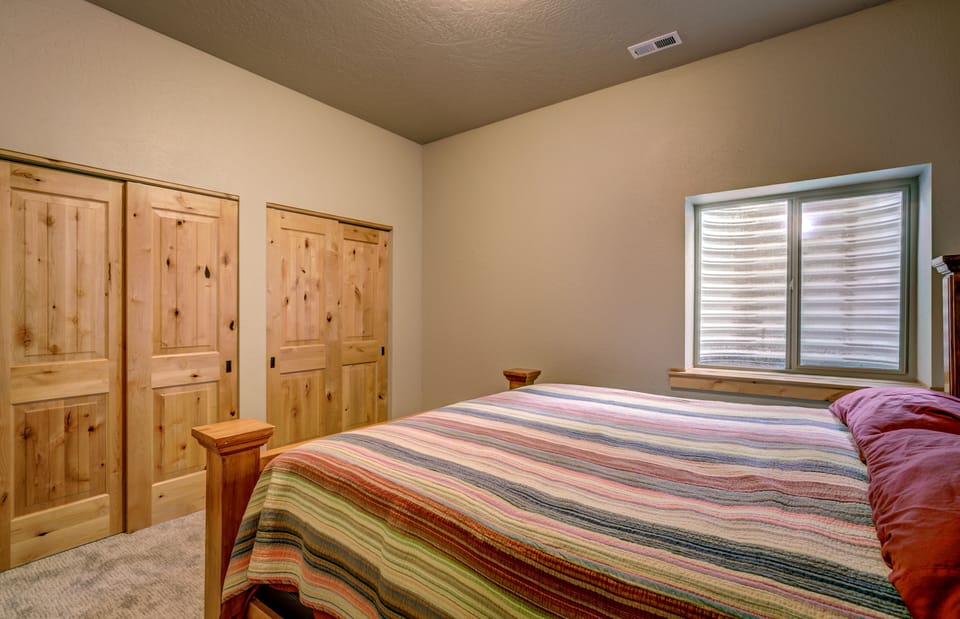 Spare bedroom with king bed
