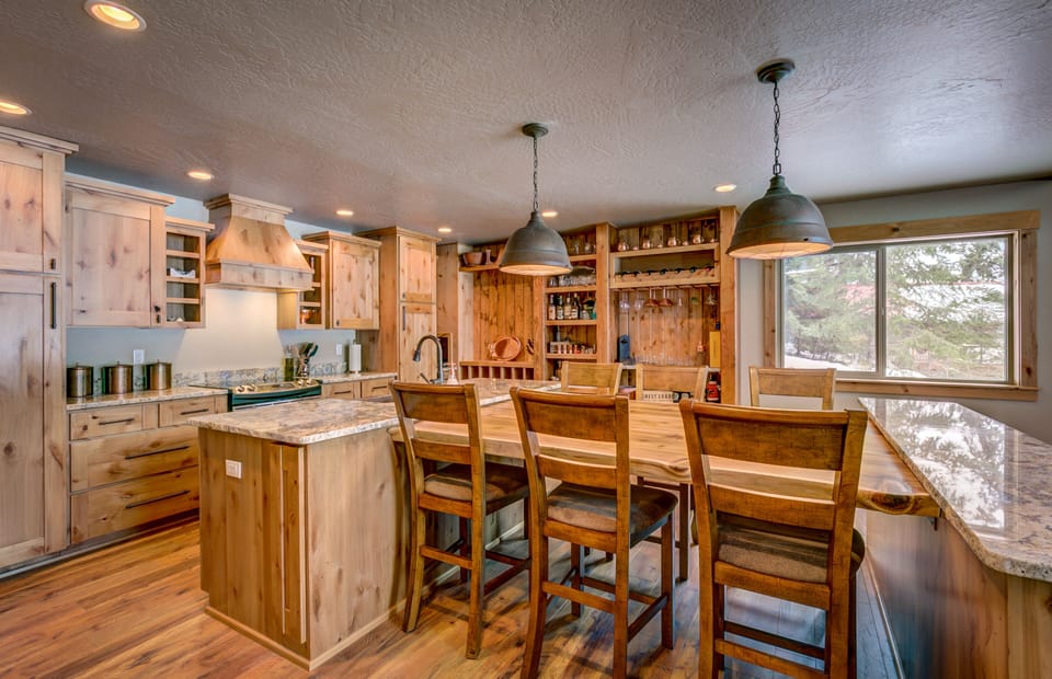 Custom kitchen with bar area built in