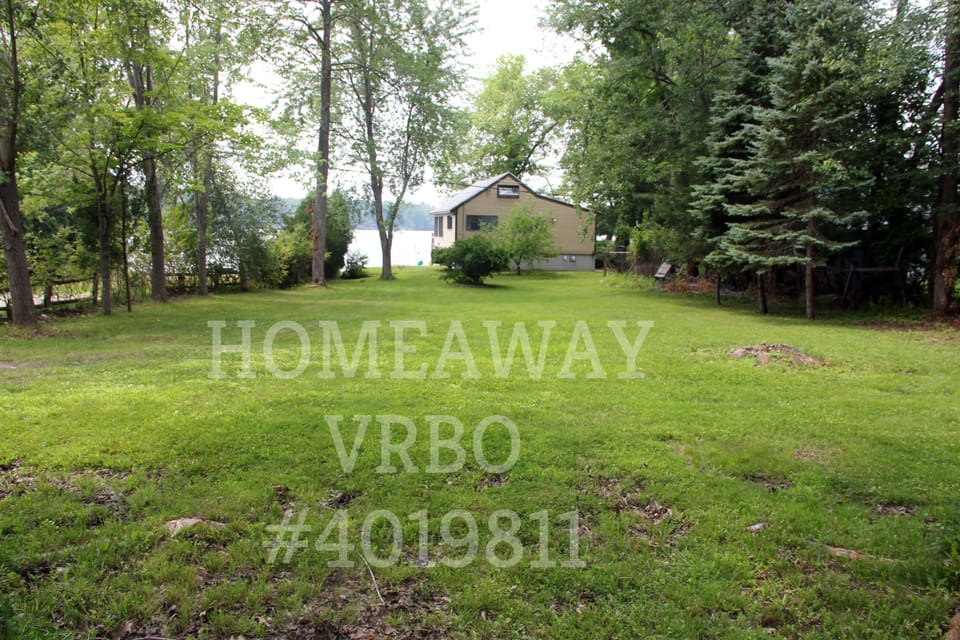 Yard is 200 ft long of flat green grass. Great for wiffleball, horse shoes, etc.