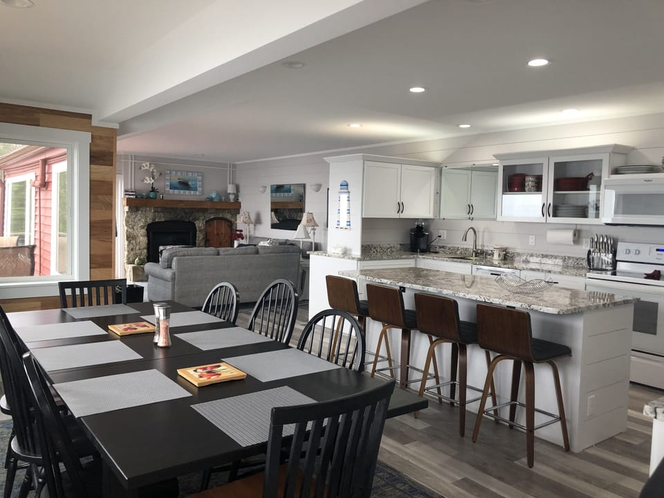 South side dining/kitchen/living area. Table extends to 102" x 38"