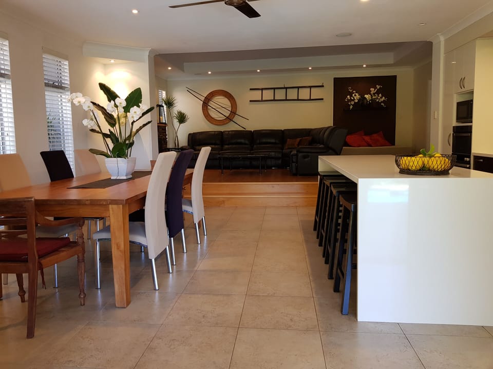 KItchen , dining and lounge over look pool and tropical gardens.
