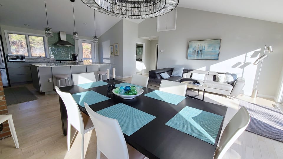 Main living area with large dining table 