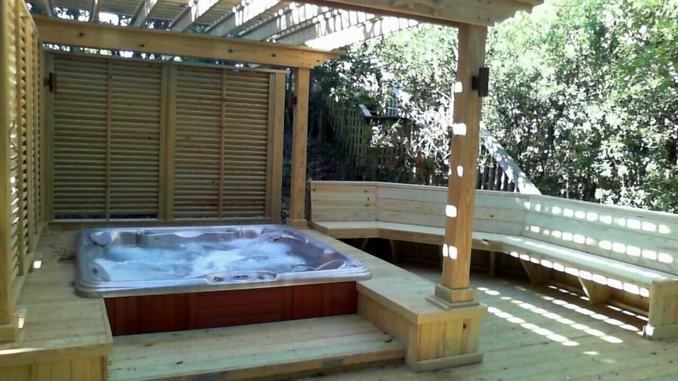 Six person hot tub and new first level entertainment deck.