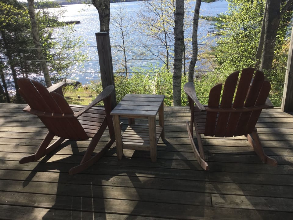Large deck with plenty of comfortable seating plus a picnic table 