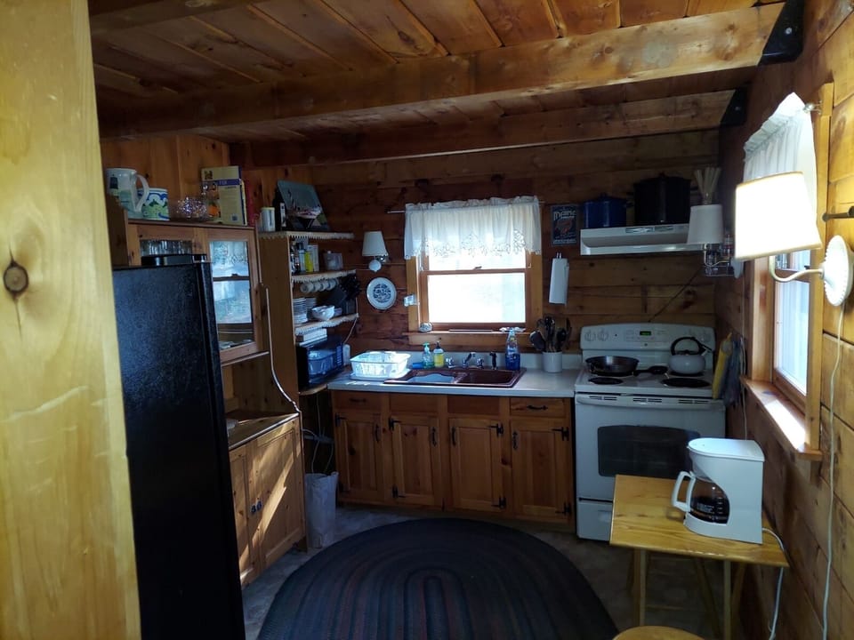Well-stocked kitchen includes a large lobster pot