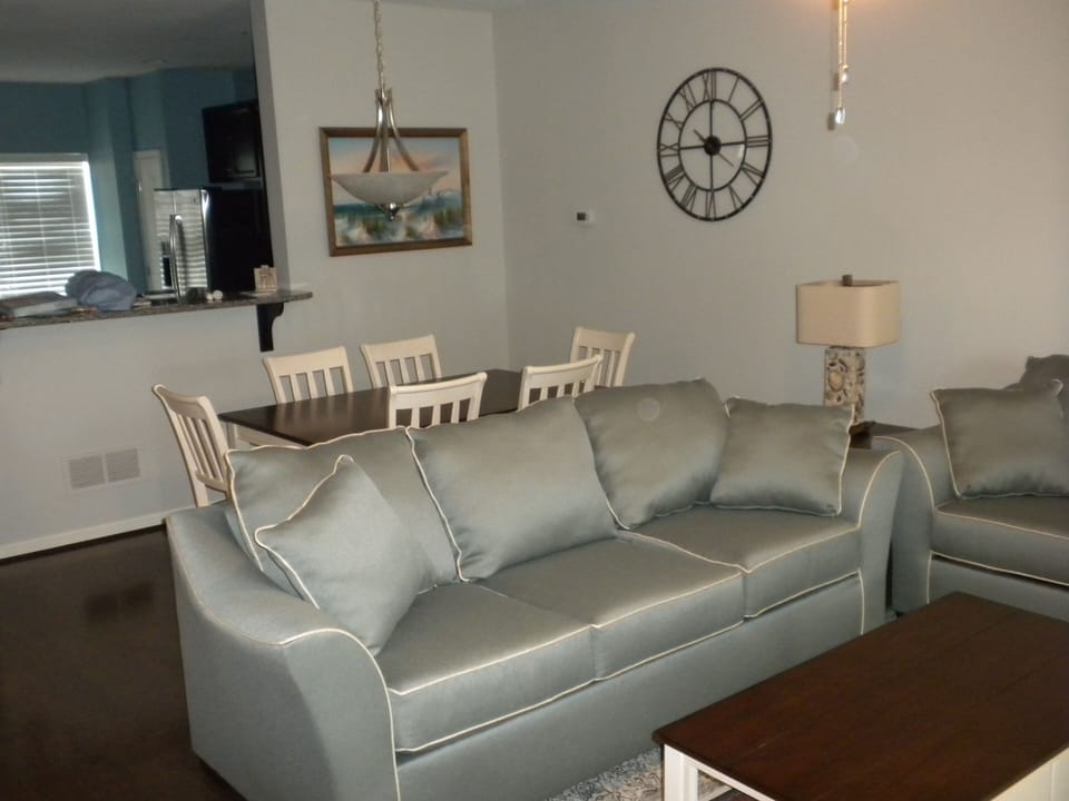 spacious living room with queen sleeper sofa