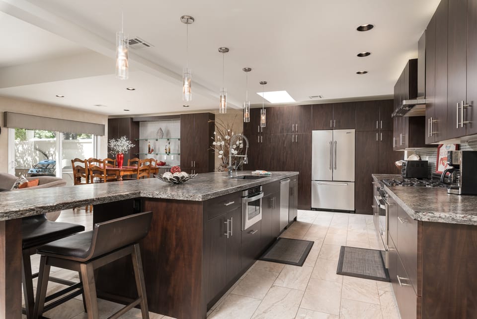State of the Art Kitchen with an Over-sized serving and dining island