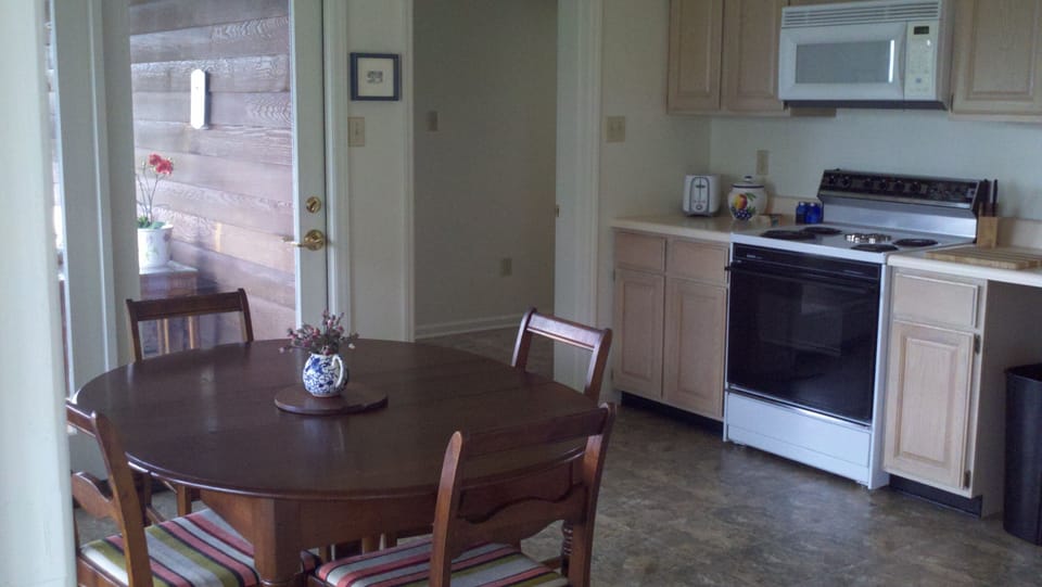 Kitchen, with view of the screen porch