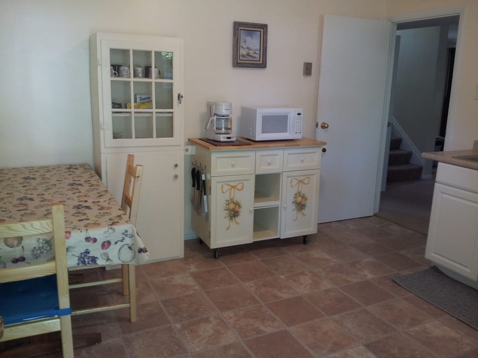 First flr kitchen w/ 2nd full size refrigerator,  sink, microwave, coffee maker