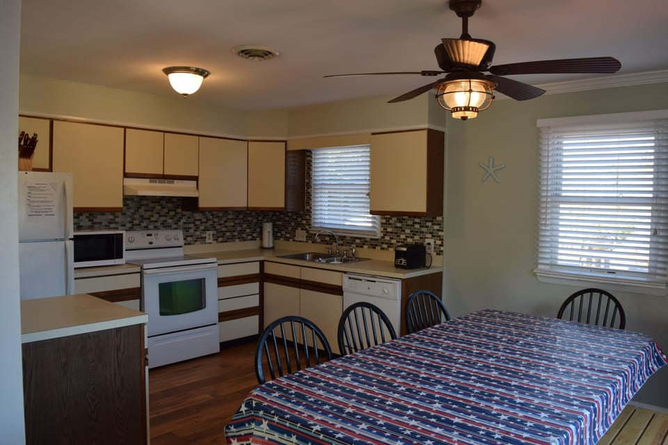 Glasses, Plates, Bowls, all Utensils, Spatulas, Cutting Boards, Pots & Pans.