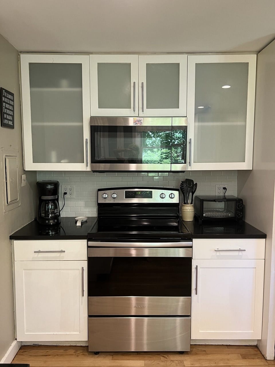 Full kitchen w stove, microwave, fridge, freezer, pot/pans/utensils/plates