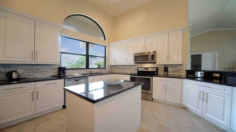 Modern kitchen with stainless steel appliances