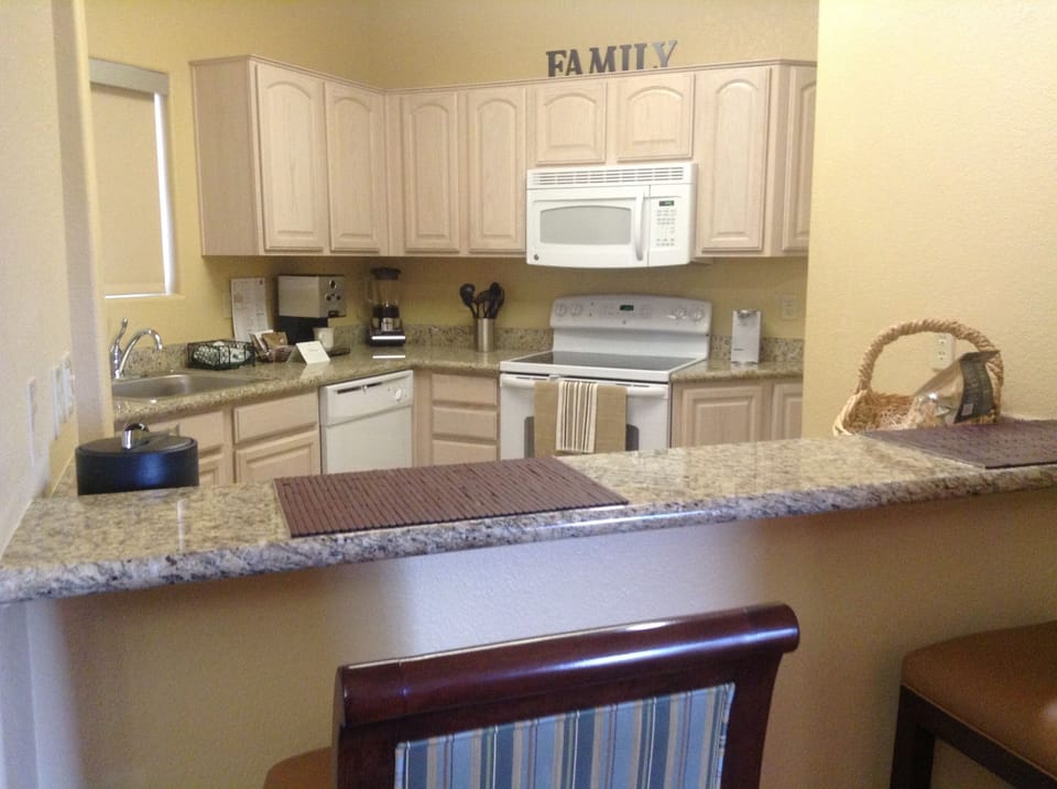 Fully equipped kitchen with all appliances,  granite counters and breakfast bar