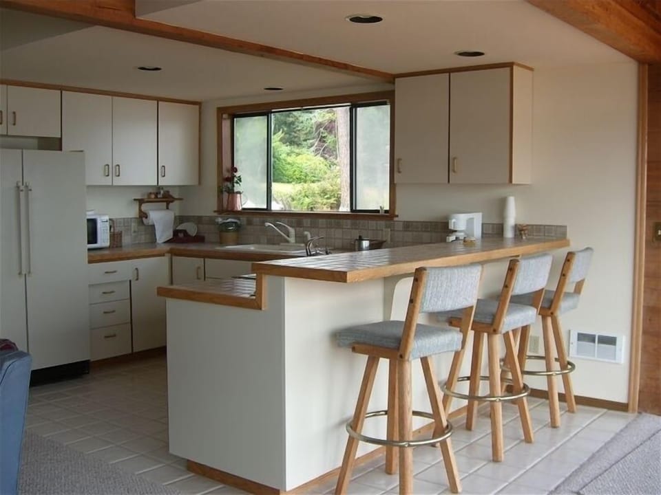 full kitchen overlooking Puget Sound