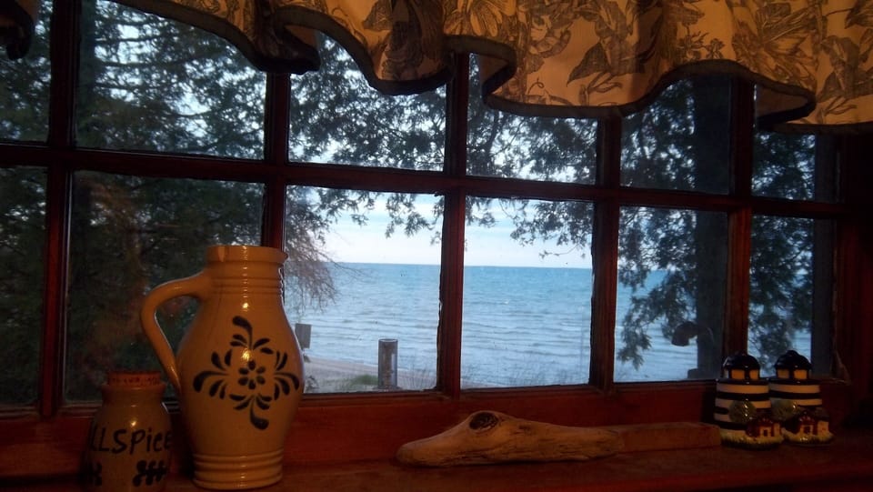 View out kitchen window while washing dishes. New window not pictured.