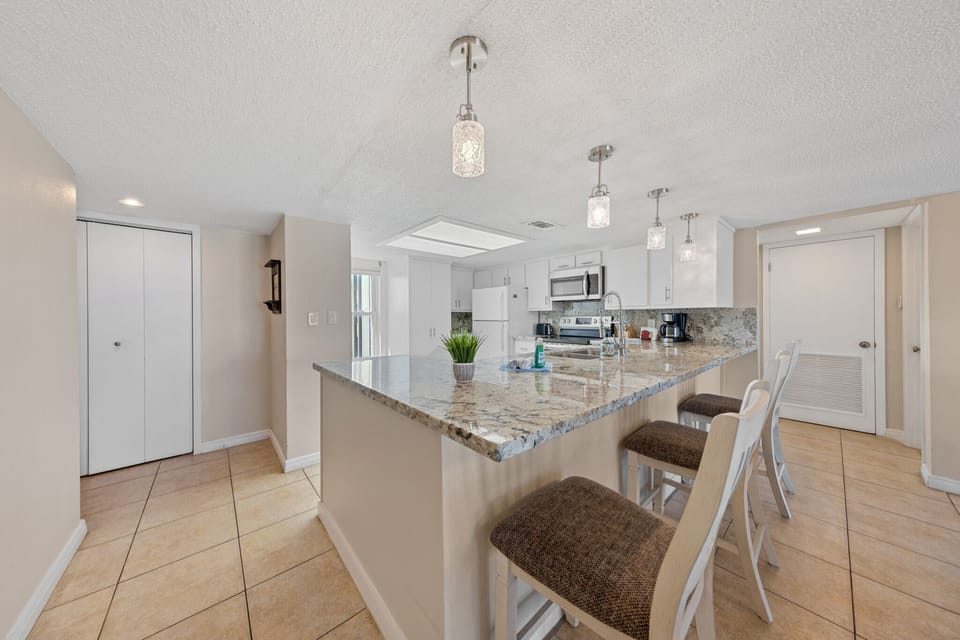 Three bar stools in kitchen bar