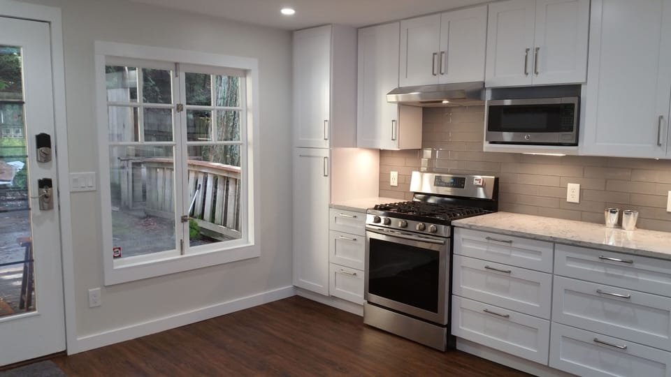 All new stainless steel appliances and marble countertops.