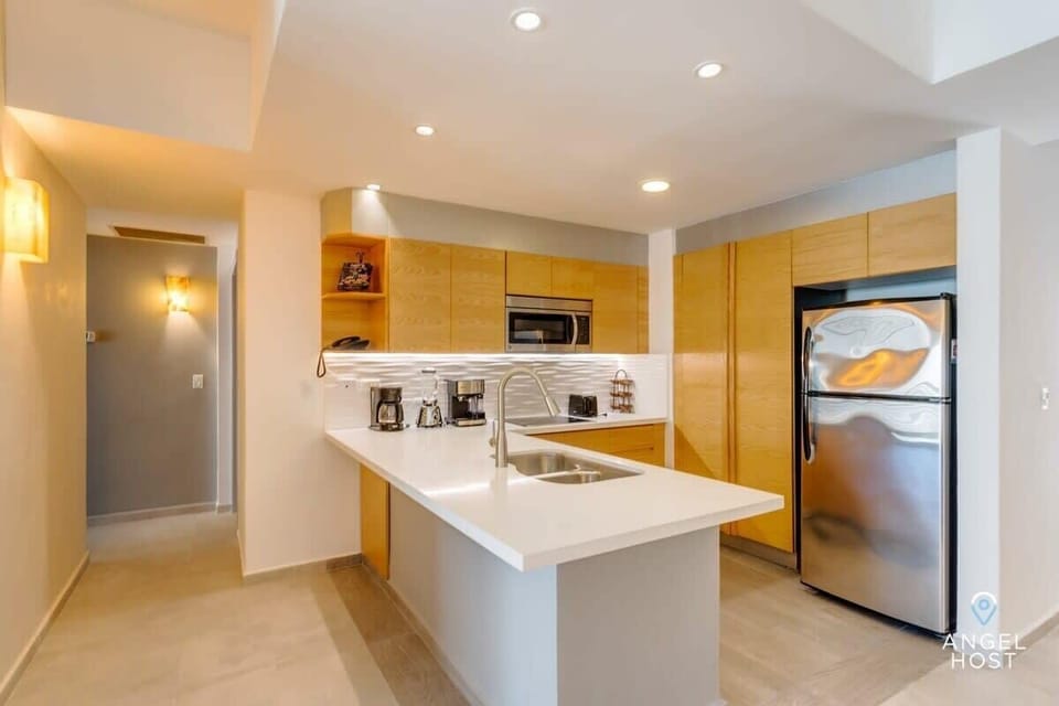 Have your morning coffee at the breakfast bar before heading out to the beach