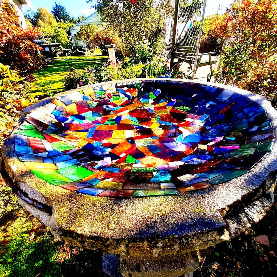 Antique glass mosaic birdbath.