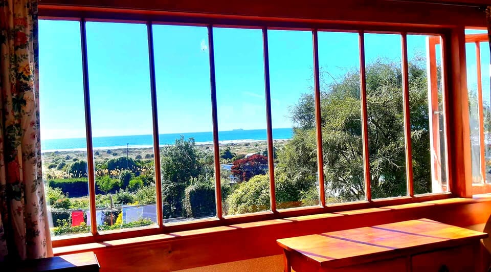 Upstairs room views of the beach.