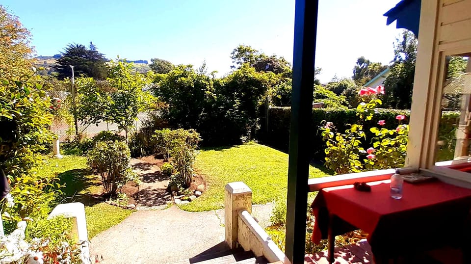 Front garden and Tennis Court from front porch.