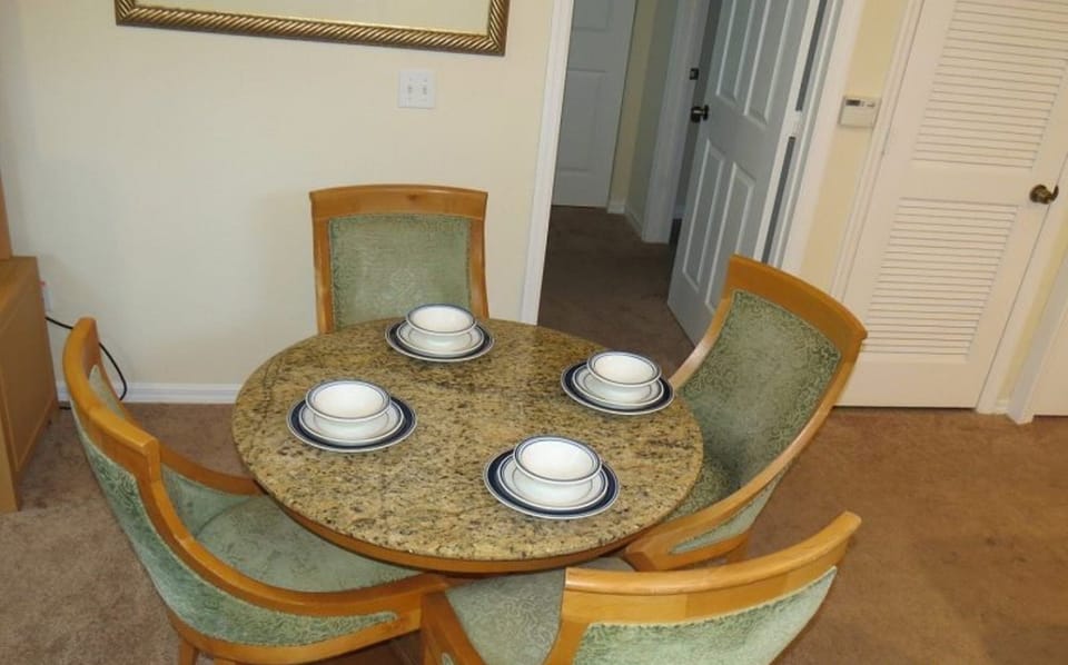 Dining Table for 4 and 2 more at the kitchen bar area