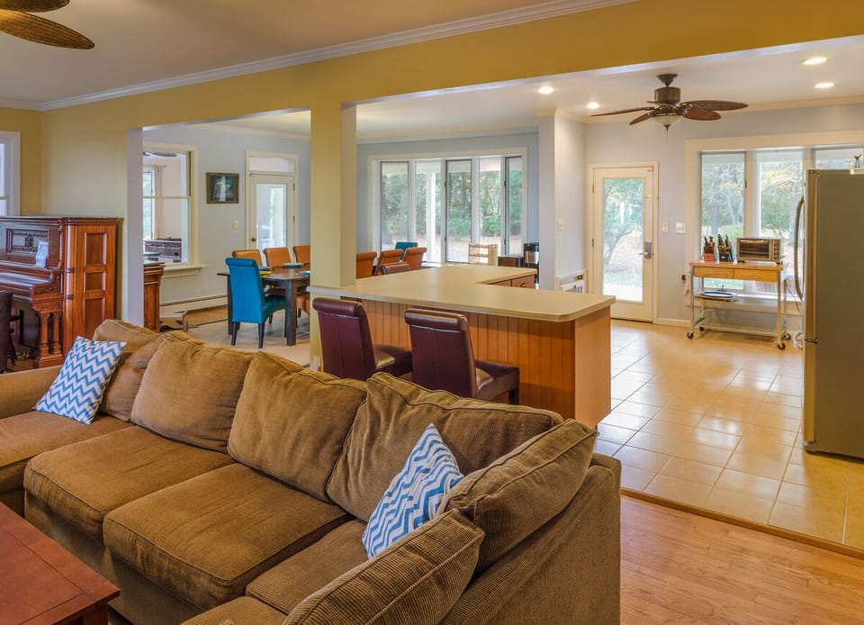 wide open main floor (with newer Yamaha M1 upright piano)
