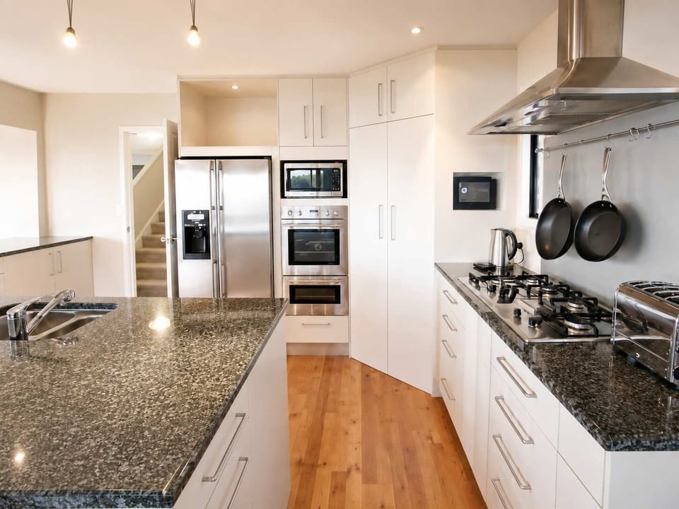 The kitchen is on the entry level and is open plan.