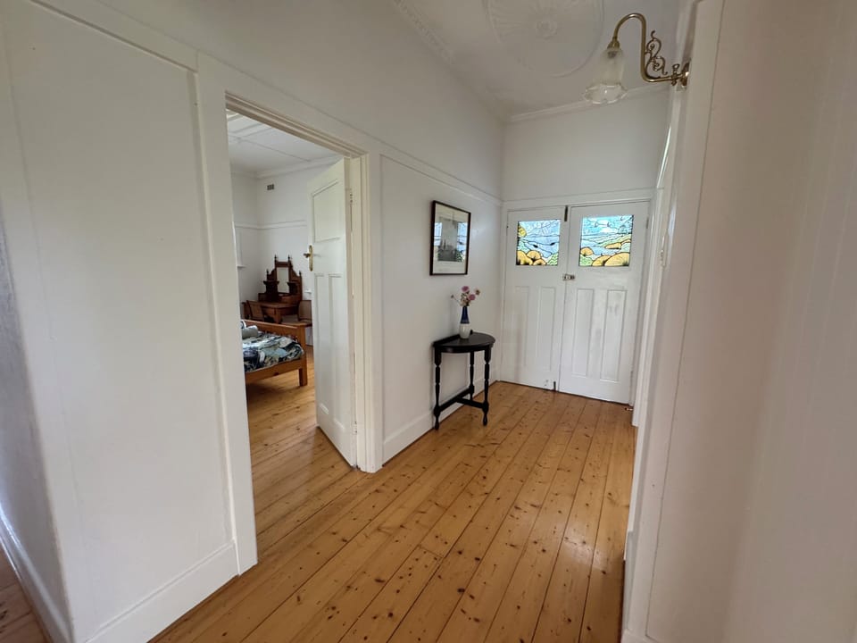 Central hallway into bedroom 1