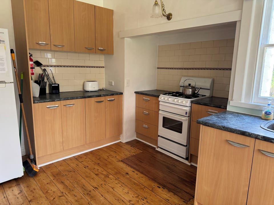Kitchen with gas stove.