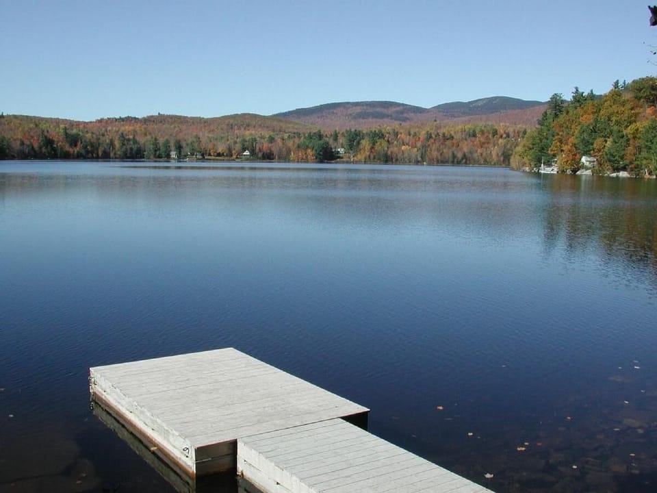 Sunset Lodge's private dock; Howard Pond in autumn