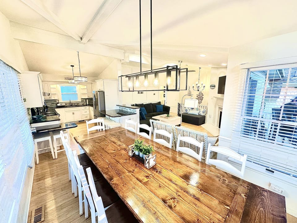 18 person seating at 12 person farm table and 6 counter seats.
