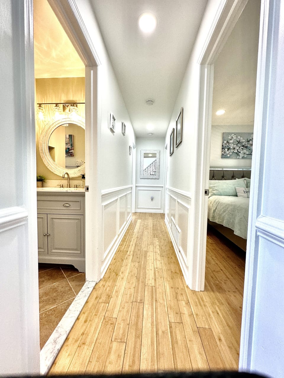 Hall way to bedrooms. King bedroom #2 on right, hall bath on left. 