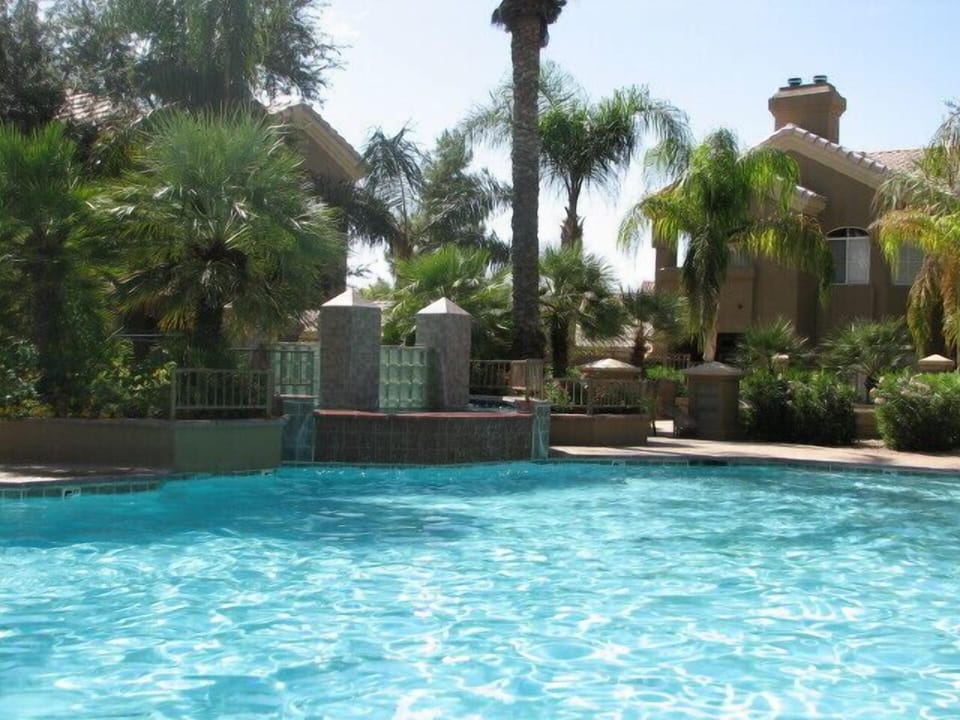 Beautiful heated pool with cascading waterfall.