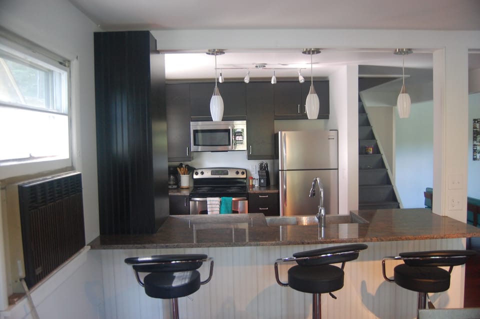 Enjoy our brand new kitchen with granite counters and stainless steel appliances