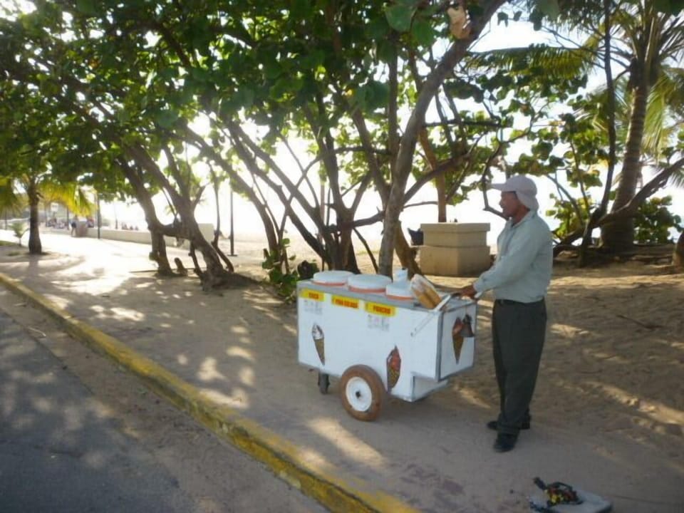 Enjoy a piragua or snow cone by the beach.