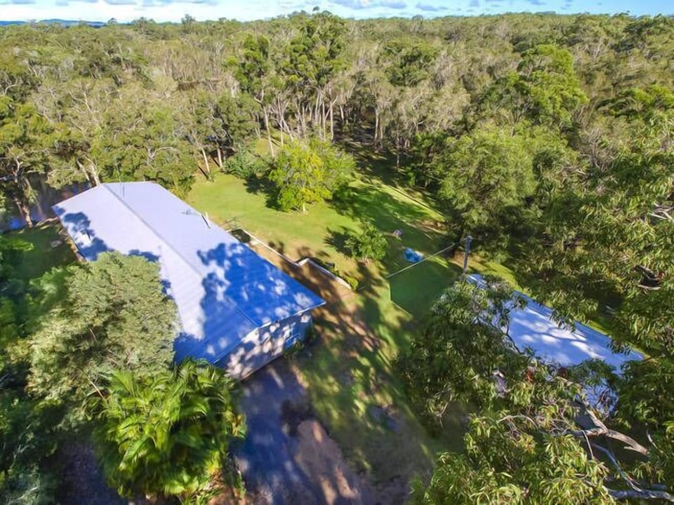 The house is set in 4 acres of bush with forest park beyond